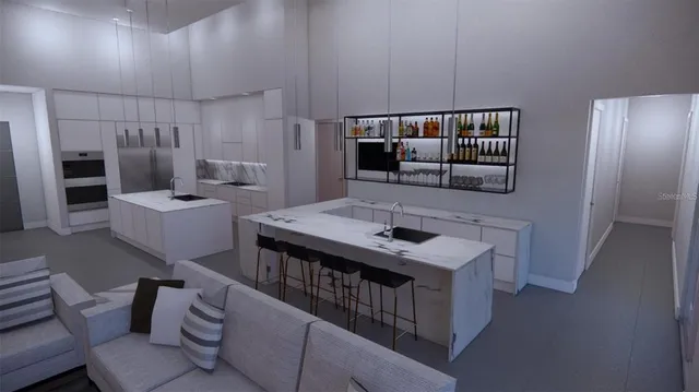 a kitchen with stainless steel appliances granite countertop a sink dishwasher stove and refrigerator