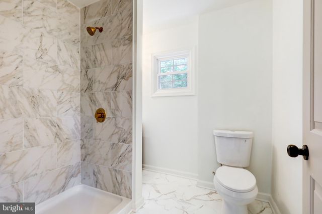 a view of deck with wooden floor and fence