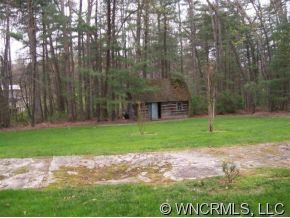 815 Gridley Road Hendersonville, NC 28739 - Photo 1 of 1 a view of a backyard with a garden