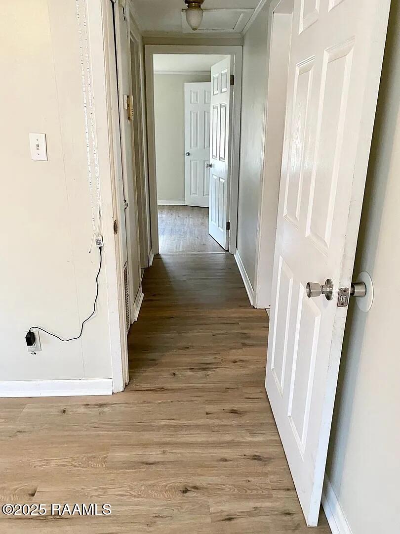 406 D Arceneaux Road Scott, LA 70583 - Photo 8 of 11 406 D Arceneaux - hall between bedrooms