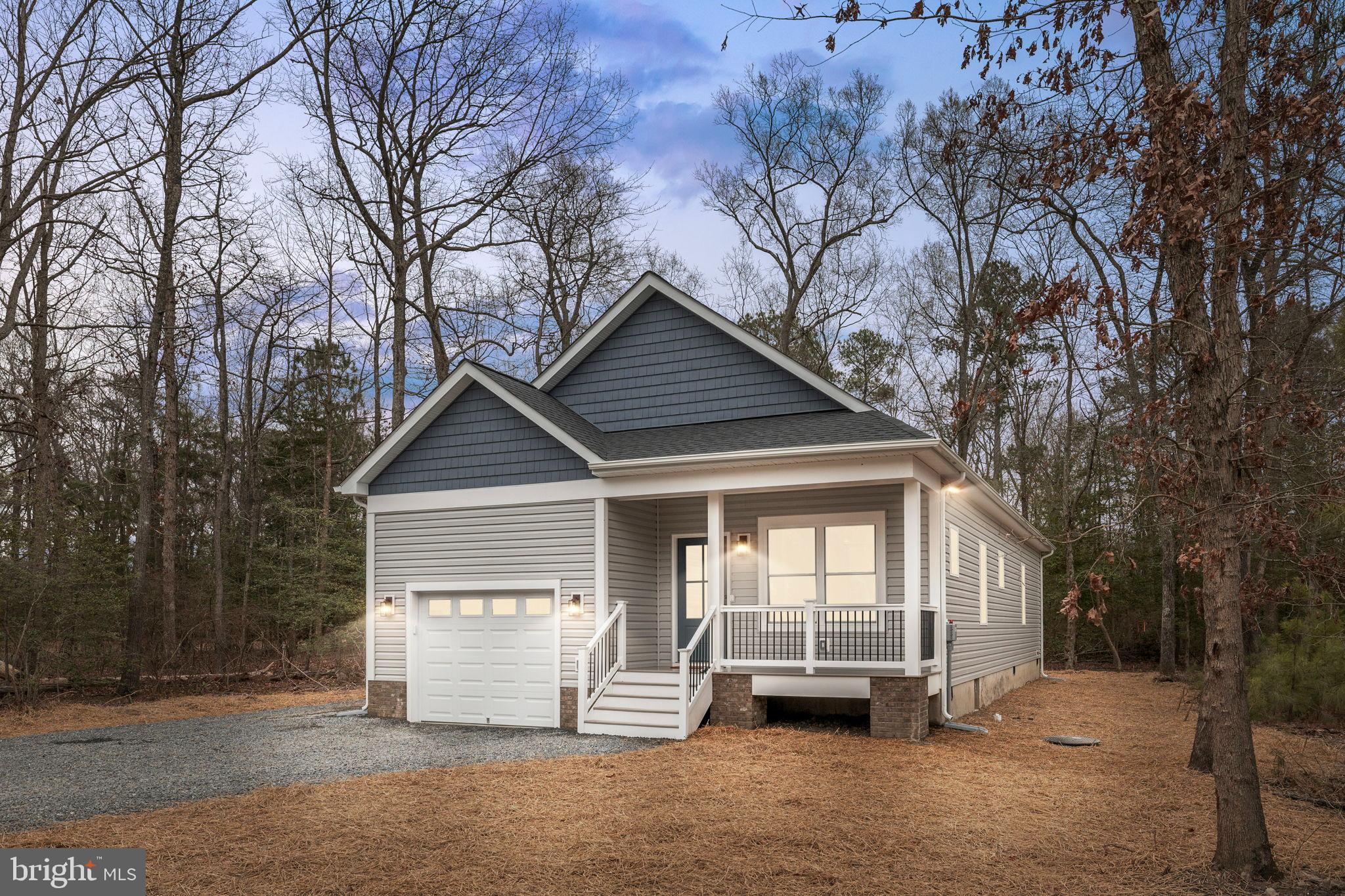 312 9th Street Colonial Beach, VA 22443 - Photo 1 of 62 Charming home nestled in serene woods.