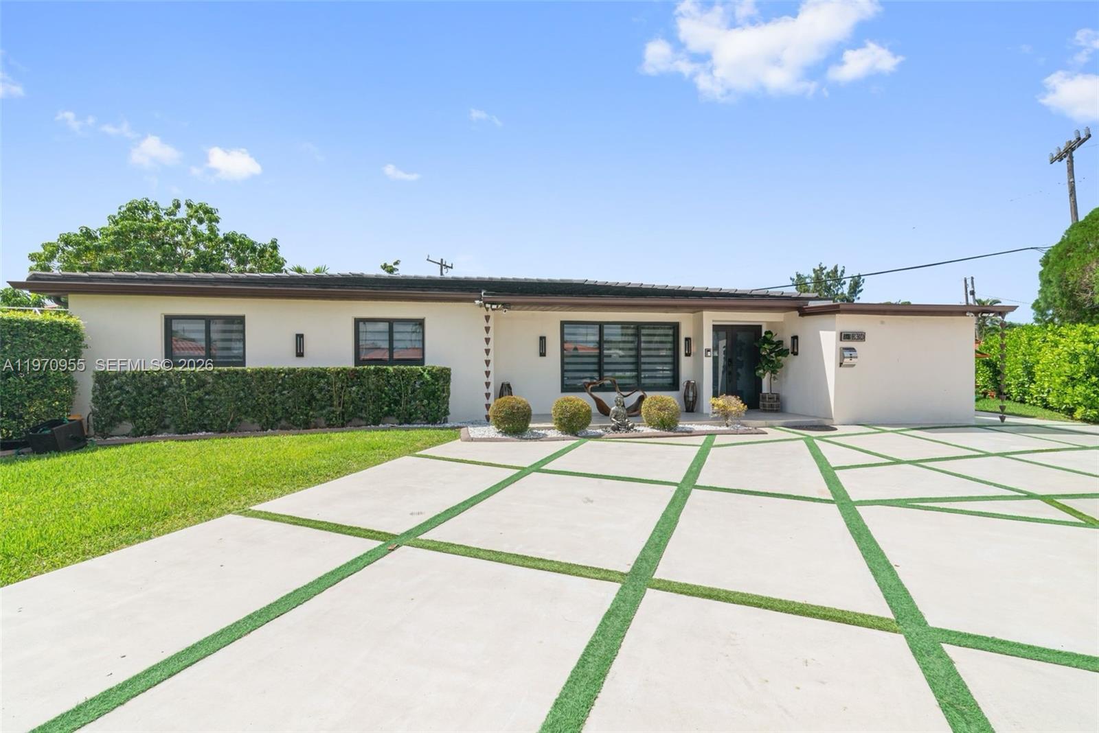 830 Southwest 93rd Avenue Miami, FL 33174 - Photo 1 of 48 a view of house with yard and entertaining space