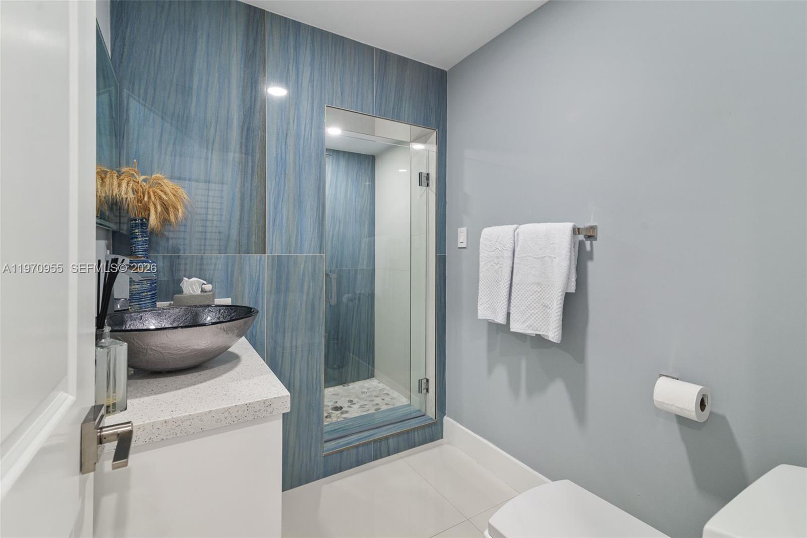 830 Southwest 93rd Avenue Miami, FL 33174 - Photo 24 of 48 a bathroom with a sink toilet and shower