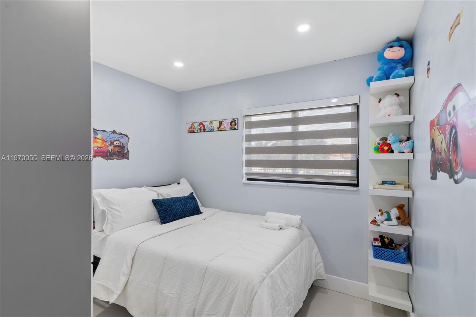 830 Southwest 93rd Avenue Miami, FL 33174 - Photo 25 of 48 a bedroom with a bed and a window
