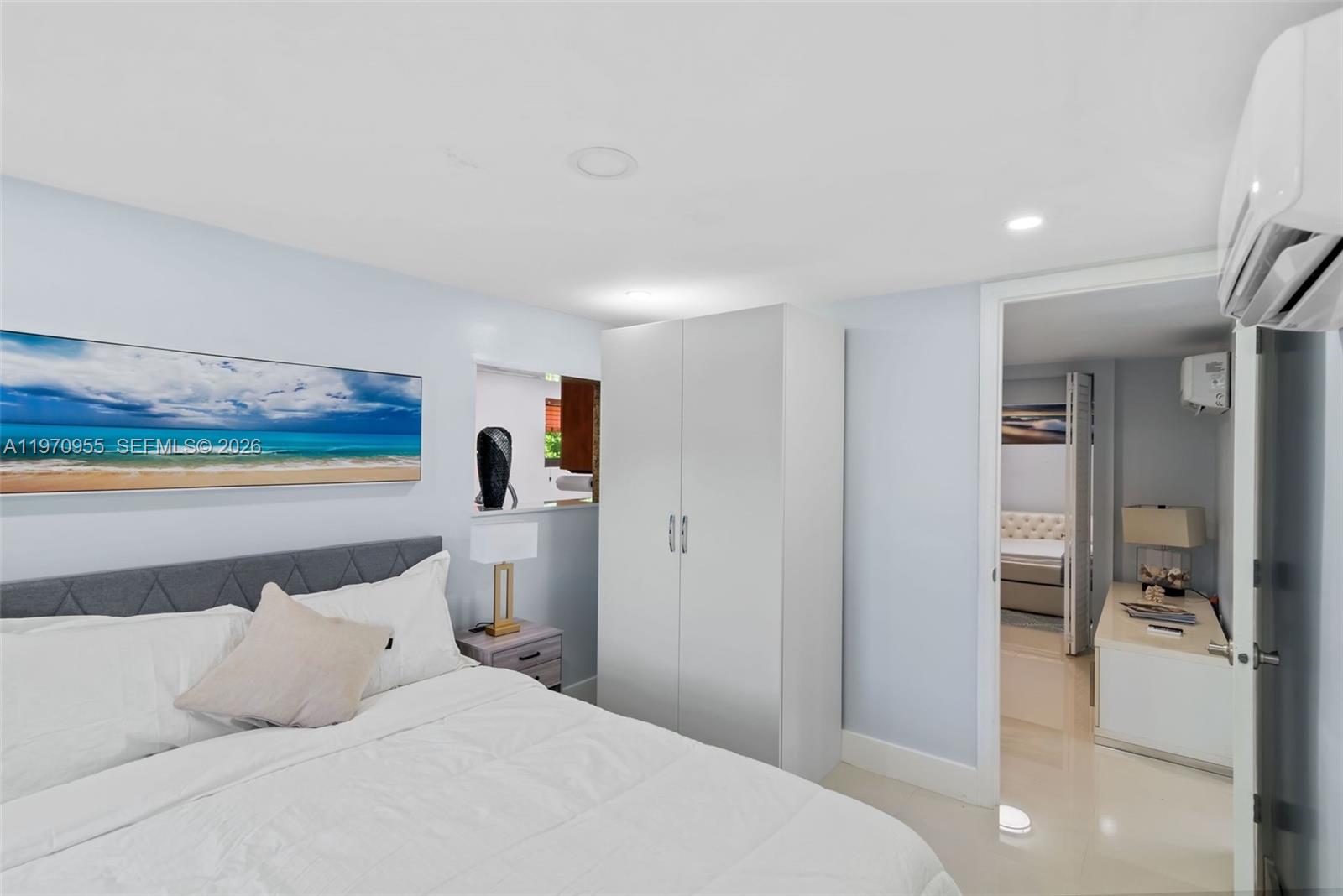 830 Southwest 93rd Avenue Miami, FL 33174 - Photo 26 of 48 a bedroom with a bed and a walk in closet