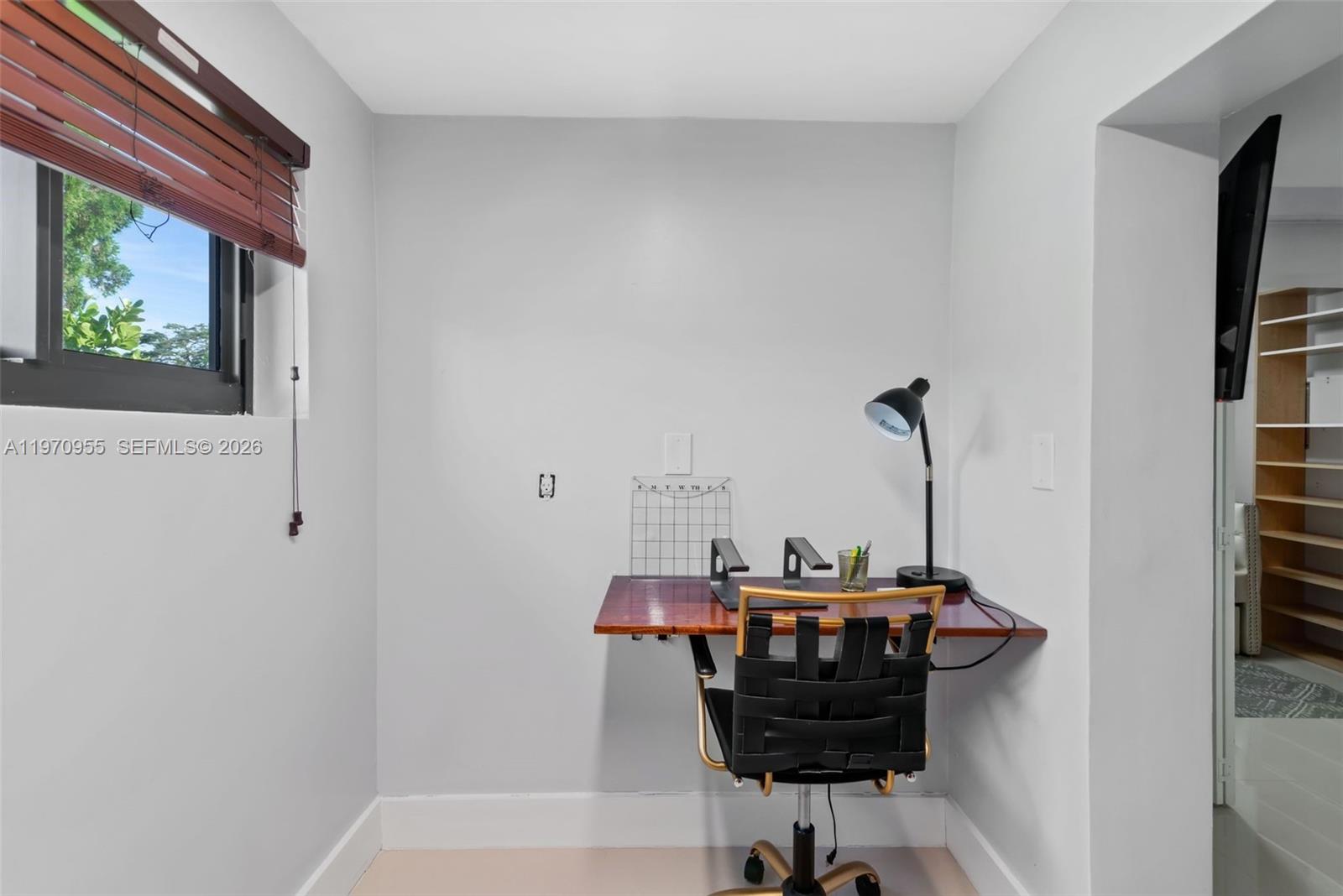 830 Southwest 93rd Avenue Miami, FL 33174 - Photo 31 of 48 a living room with furniture and a window