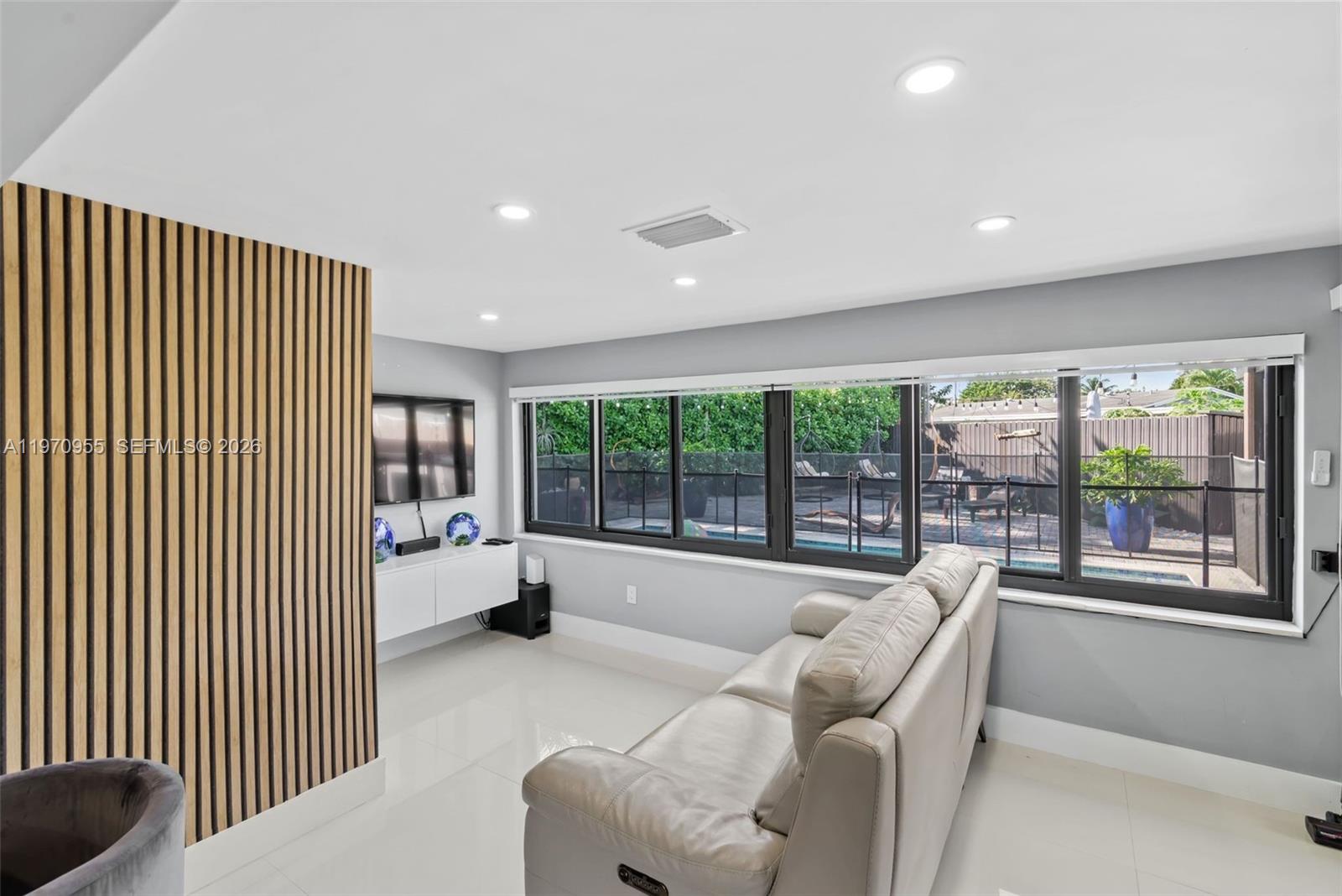 830 Southwest 93rd Avenue Miami, FL 33174 - Photo 34 of 48 a living room with furniture and a large window