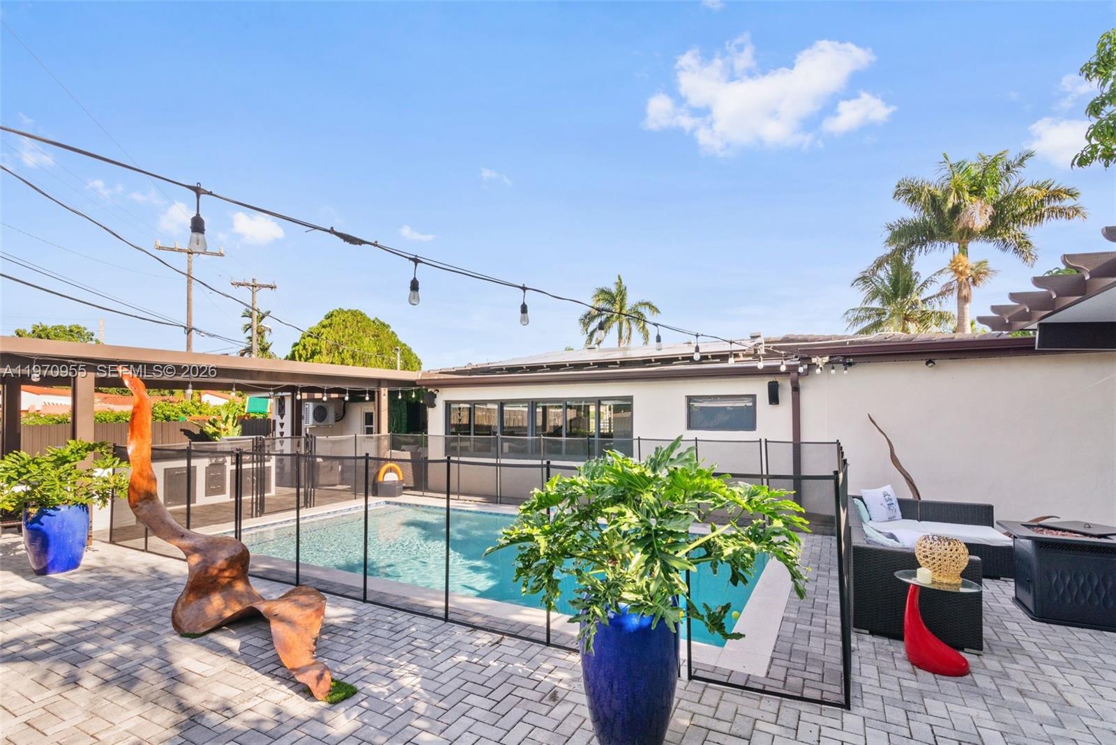 830 Southwest 93rd Avenue Miami, FL 33174 - Photo 39 of 48 a view of a house with outdoor seating