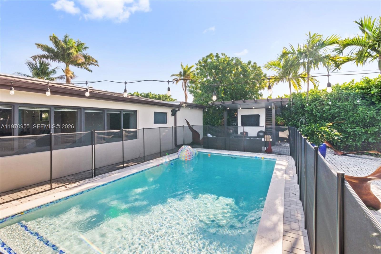 830 Southwest 93rd Avenue Miami, FL 33174 - Photo 45 of 48 a view of a house with a swimming pool