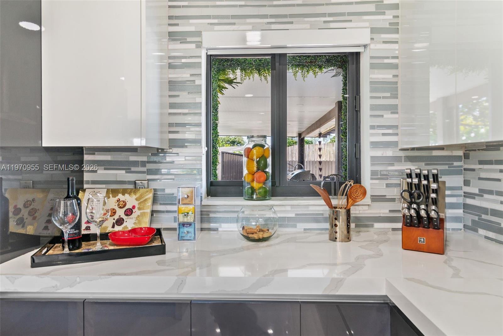830 Southwest 93rd Avenue Miami, FL 33174 - Photo 7 of 48 a kitchen with a sink and a window