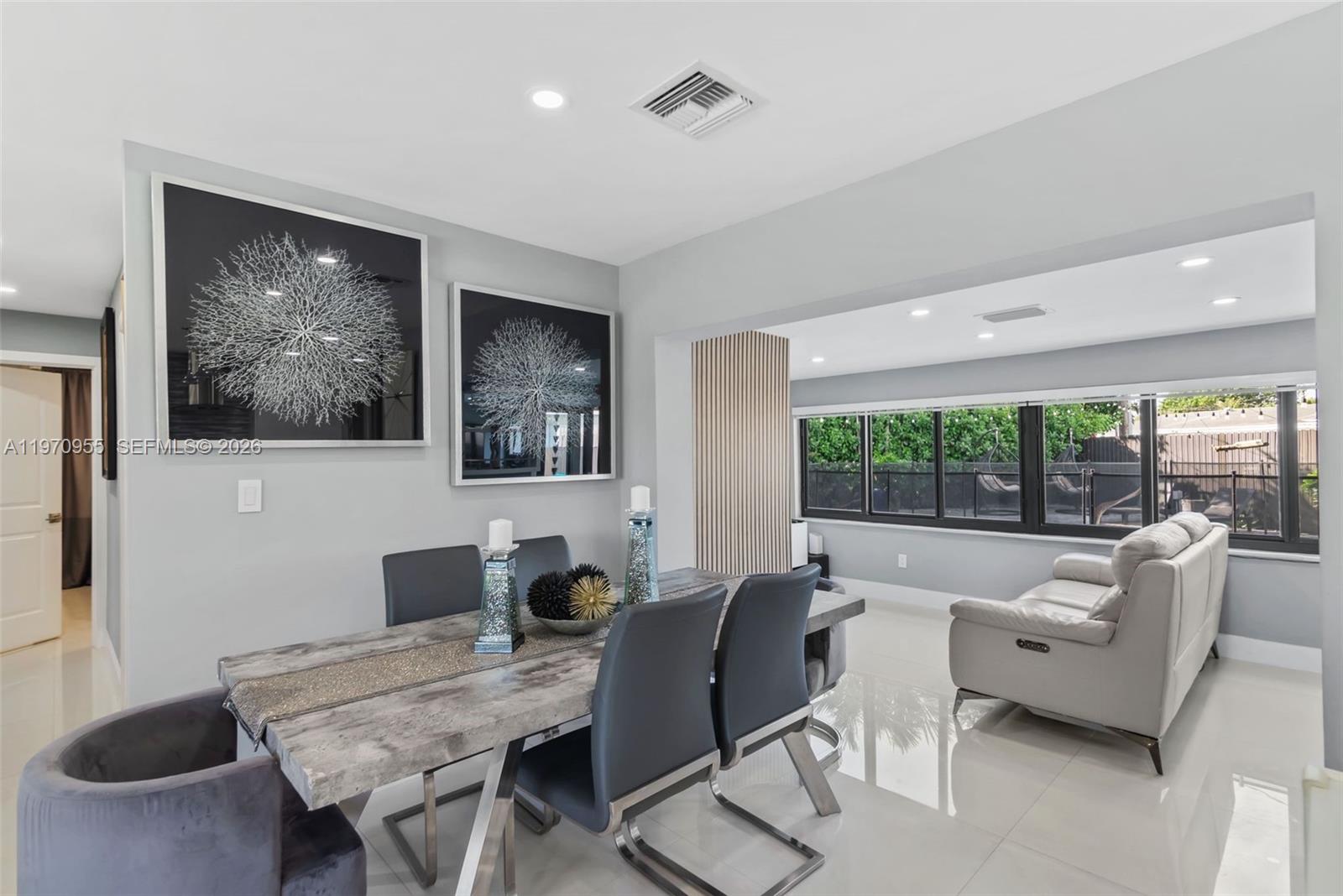 830 Southwest 93rd Avenue Miami, FL 33174 - Photo 8 of 48 a workspace with furniture and a large window