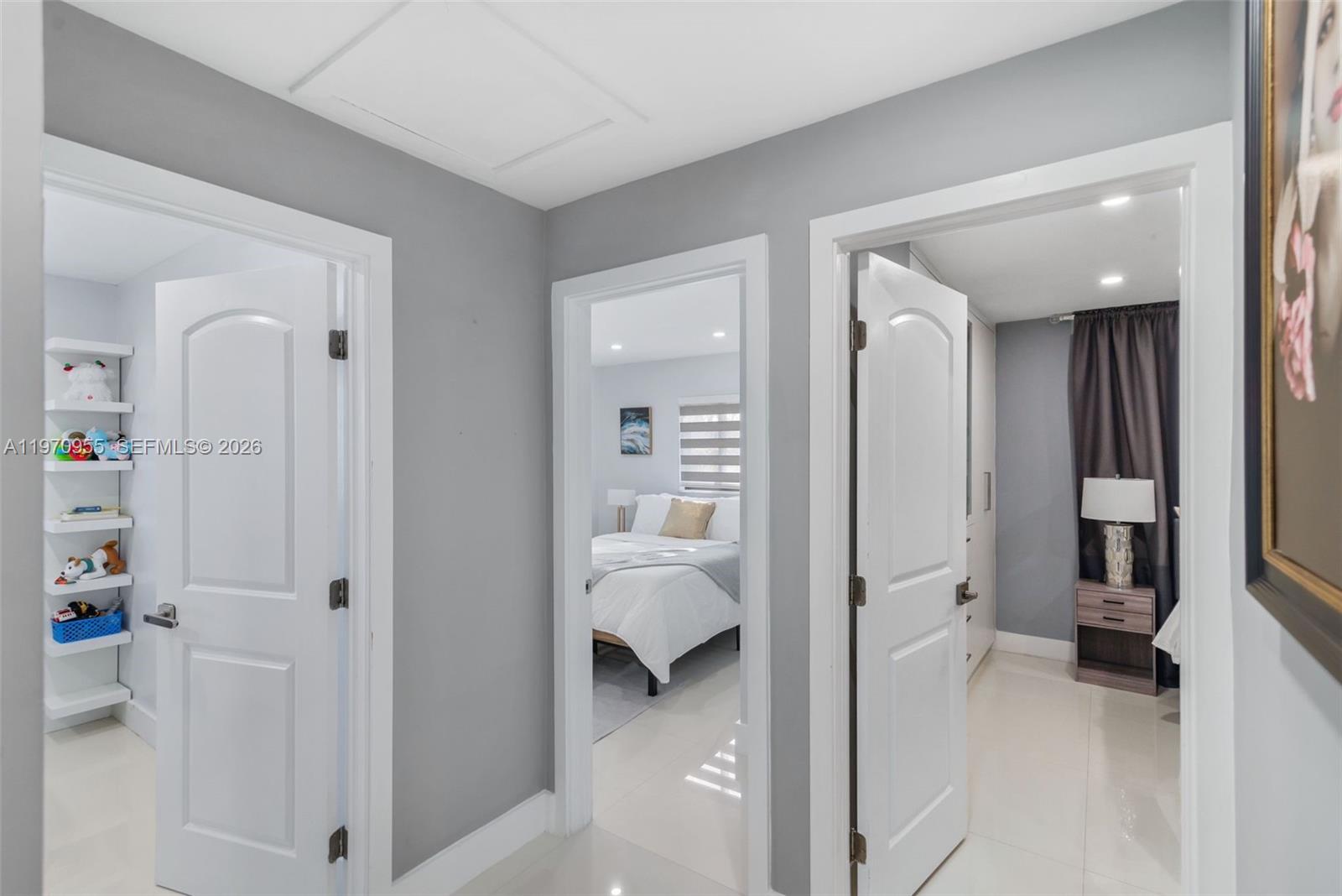 830 Southwest 93rd Avenue Miami, FL 33174 - Photo 9 of 48 a view of a bathroom with tub and mirrors