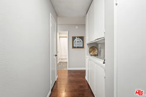 a view of a hallway with door
