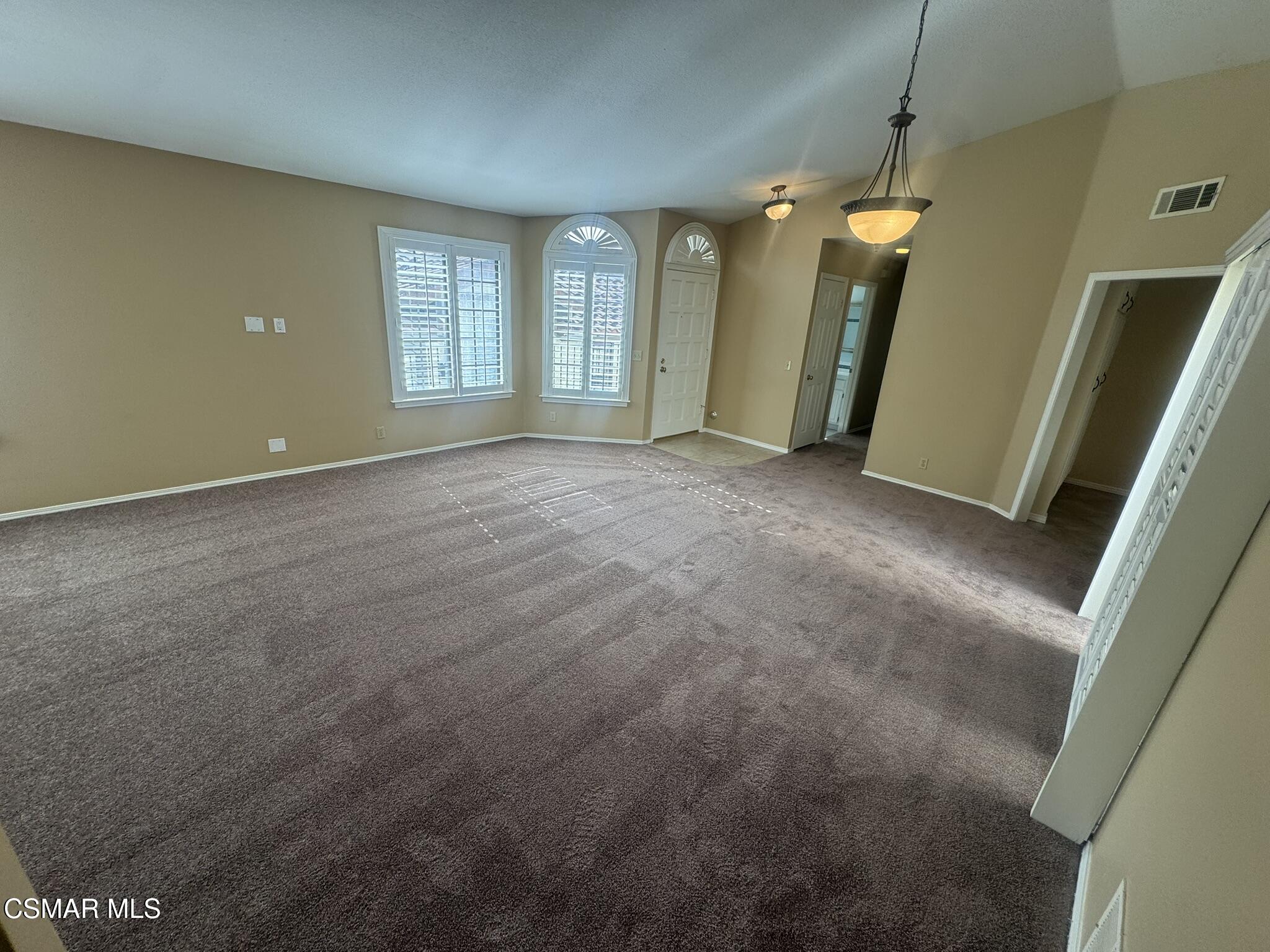 616 Cartpath Place Simi Valley, CA 93065 - Photo 5 of 17 a view of livingroom with hardwood floor and windows
