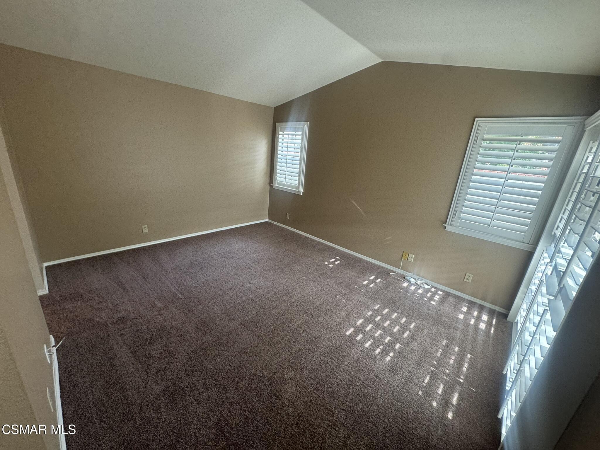 616 Cartpath Place Simi Valley, CA 93065 - Photo 6 of 17 a view of an empty room with windows