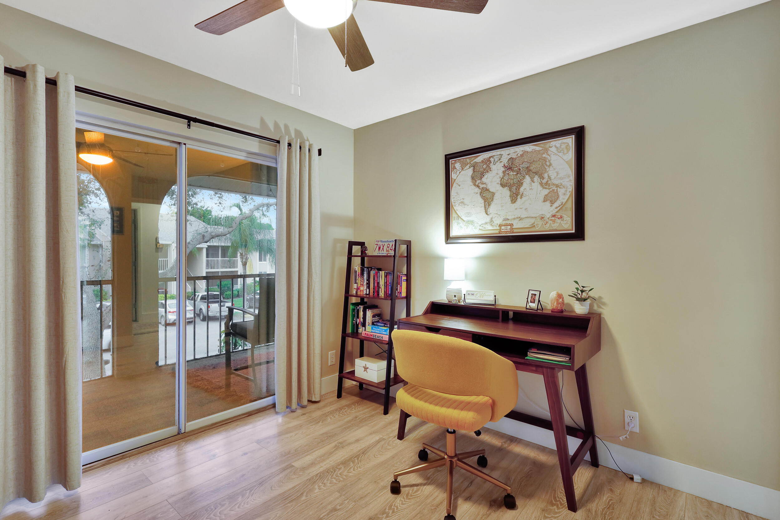 13851 Oneida Drive, Unit B2 Delray Beach, FL 33446 - Photo 25 of 30 a view of a workspace with furniture and a window