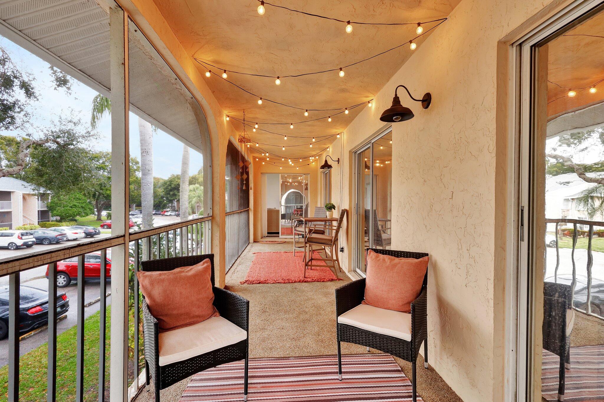 13851 Oneida Drive, Unit B2 Delray Beach, FL 33446 - Photo 29 of 30 a outdoor living space with furniture