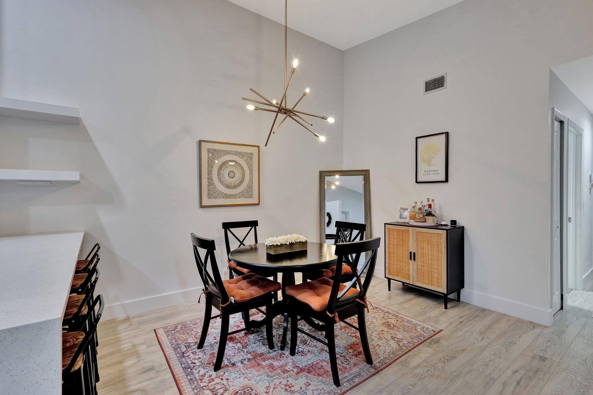 13851 Oneida Drive, Unit B2 Delray Beach, FL 33446 - Photo 7 of 30 a dining room with furniture and window