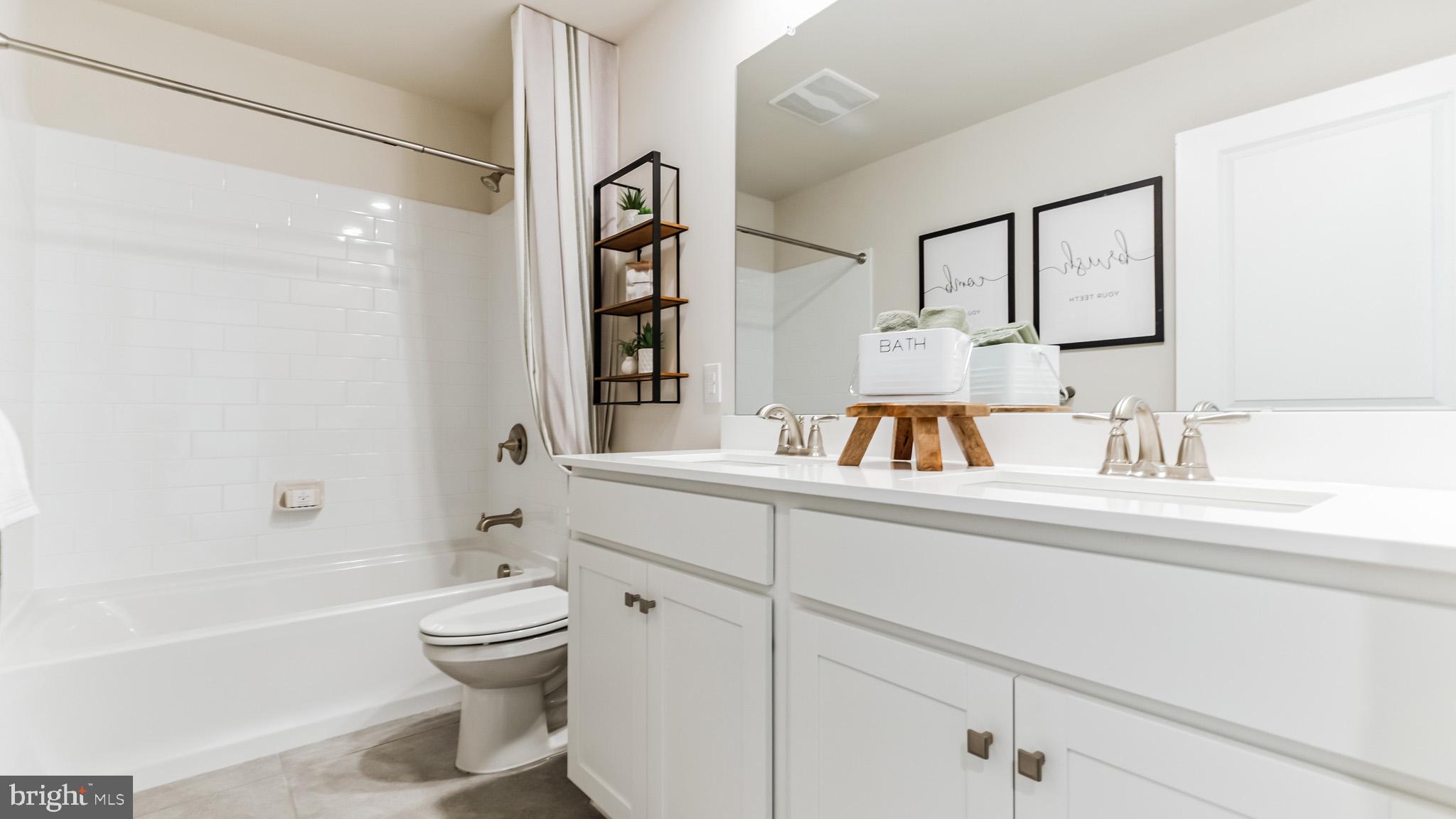 115 Winding Road Easton, PA 18040 - Photo 19 of 26 a bathroom with a sink a toilet and shower