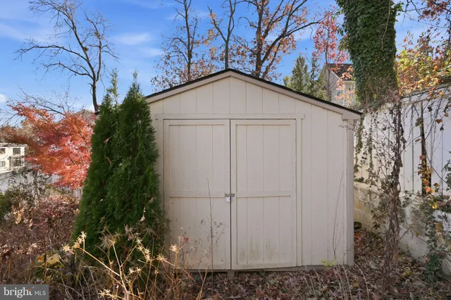 a view of a house with a tree
