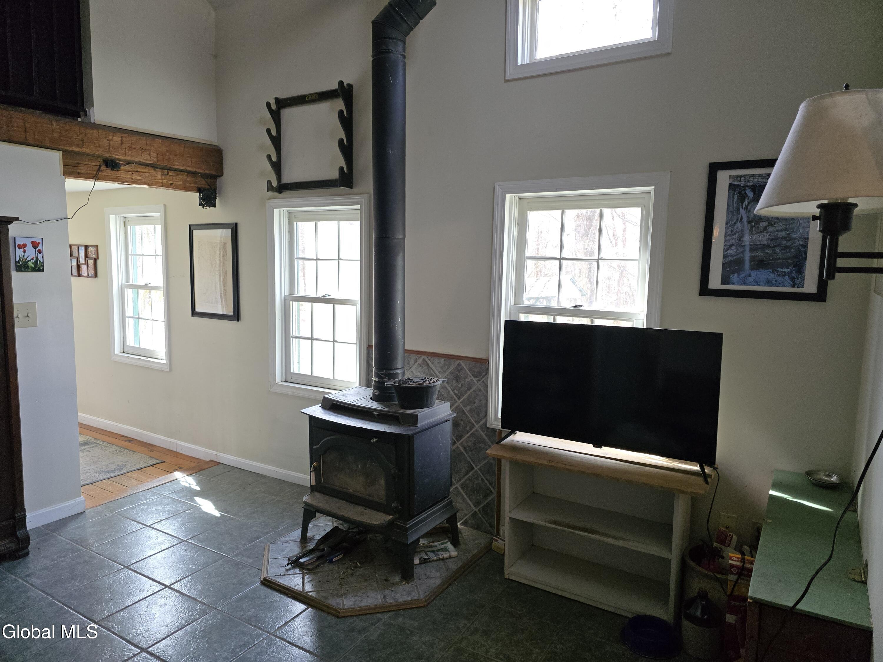 344 Dyken Pond Road Berlin, NY 12138 - Photo 11 of 38 10 Living rm wood stove