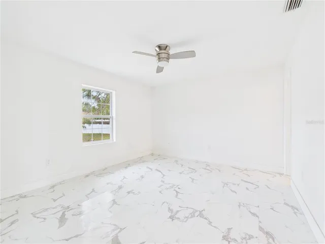 a view of a room with an empty room