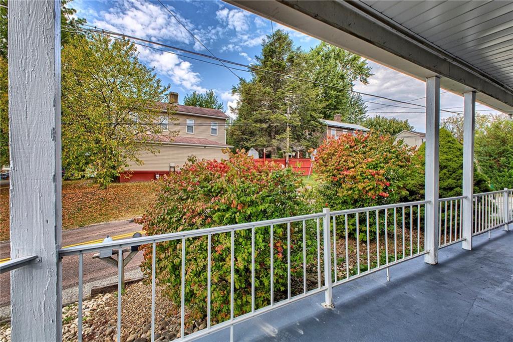 108 Pandora Road Loyalhanna, PA 15661 - Photo 22 of 23 a view of a balcony with flower plants