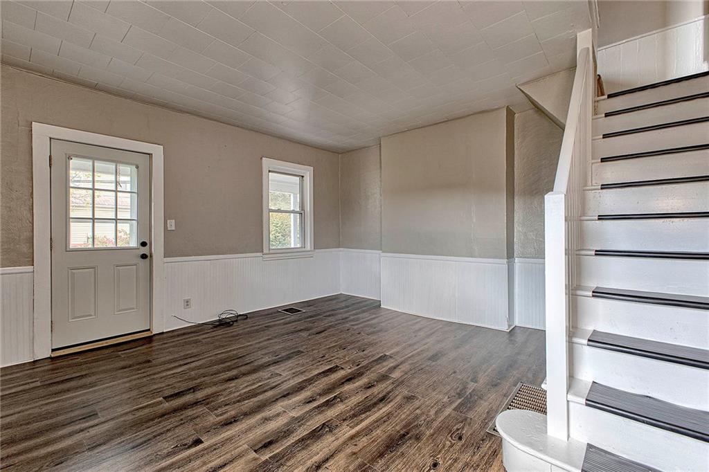 108 Pandora Road Loyalhanna, PA 15661 - Photo 3 of 23 a view of empty room with wooden floor and fan