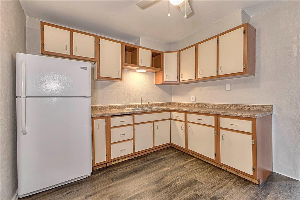 108 Pandora Road Loyalhanna, PA 15661 - Photo 6 of 23 a kitchen with stainless steel appliances granite countertop a refrigerator sink and cabinets
