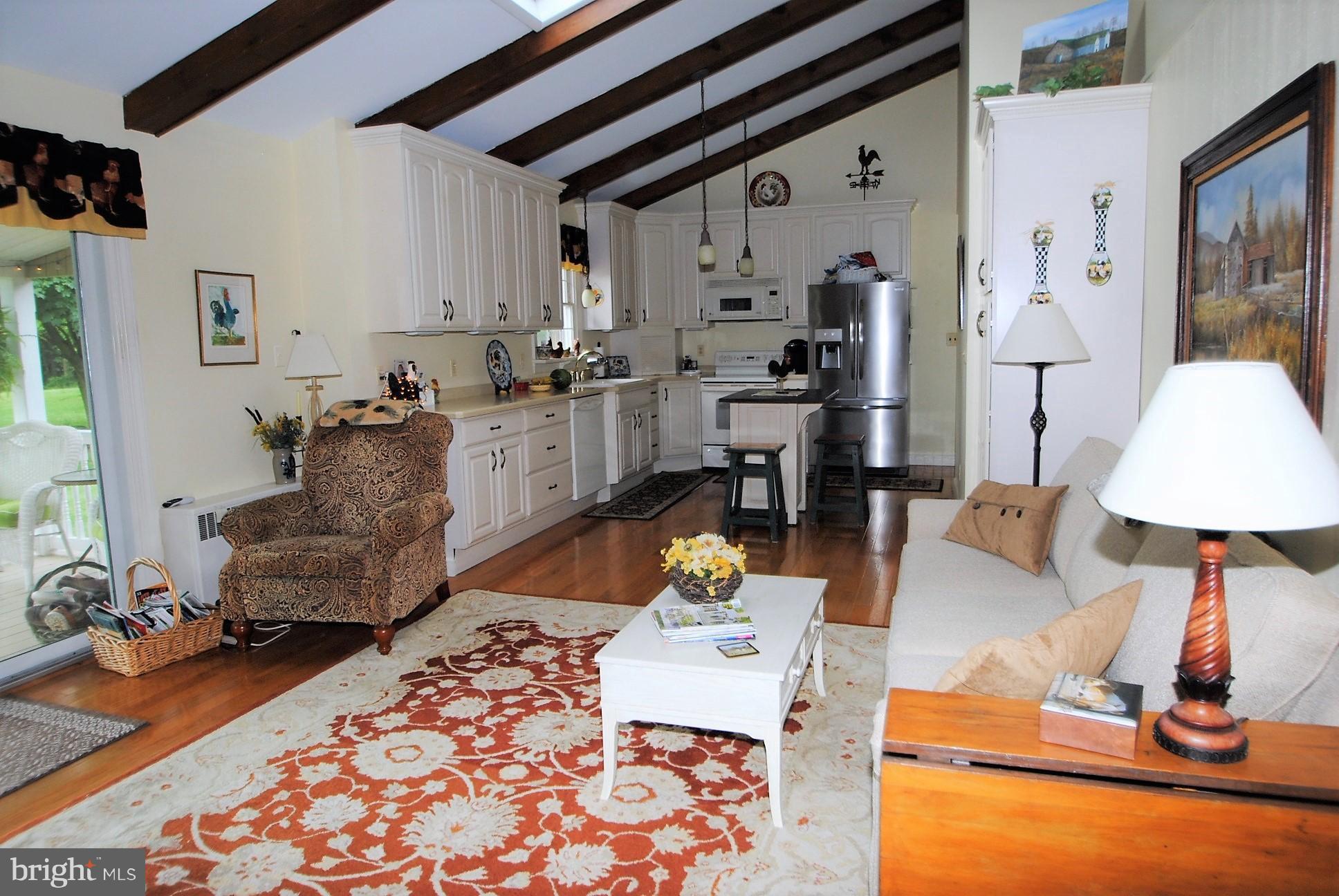 760 Warburton Road Elkton, MD 21921 - Photo 11 of 30 Beamed raised ceilings add to the openness