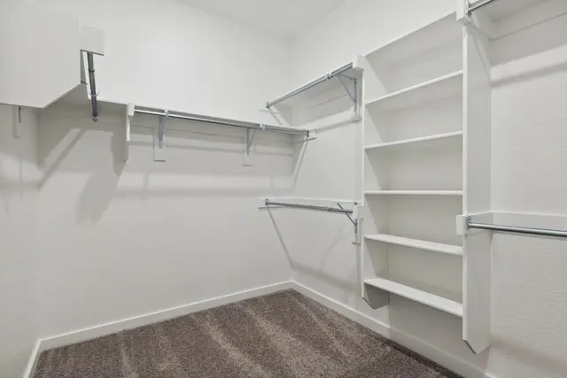 a view of an empty walk in closet
