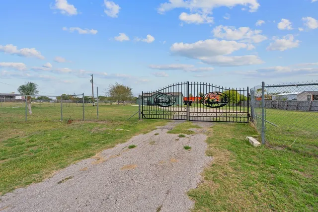 a view of a lake with a garden