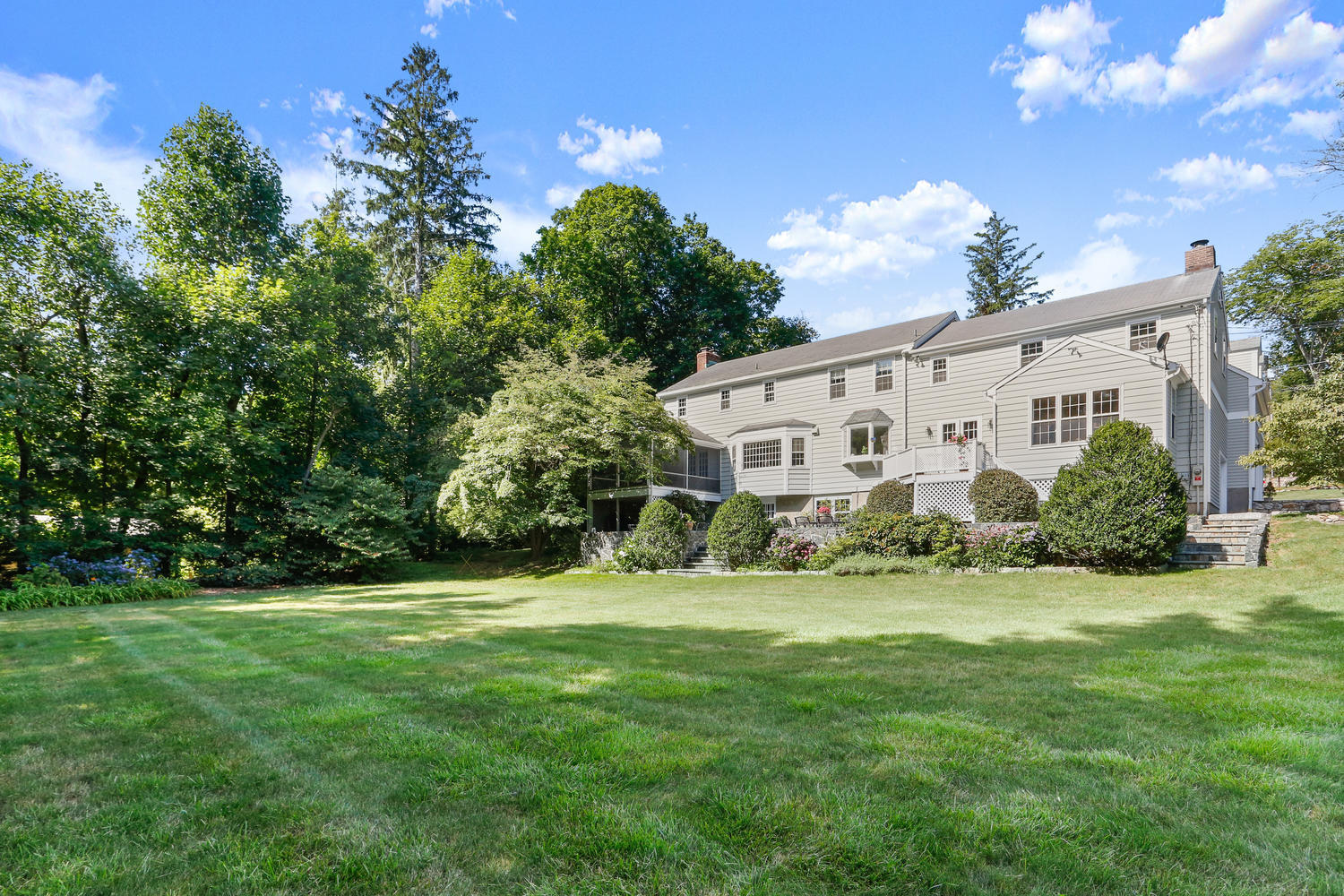 116 Marshall Ridge Road New Canaan, CT 06840 - Photo 11 of 50 a view of a house with backyard and garden