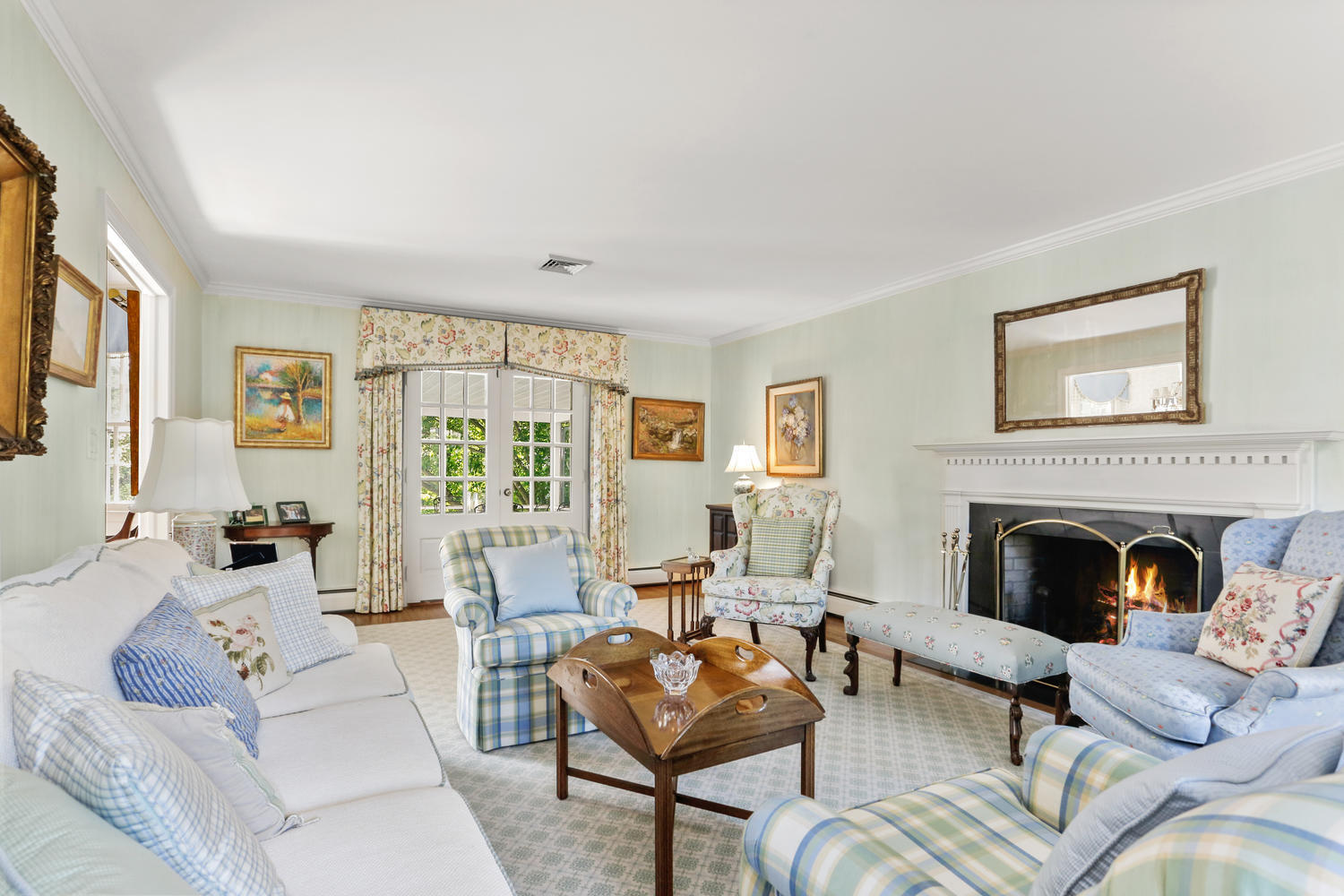 116 Marshall Ridge Road New Canaan, CT 06840 - Photo 18 of 50 a living room with furniture and a fireplace