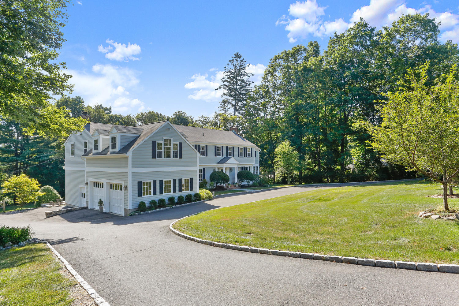 116 Marshall Ridge Road New Canaan, CT 06840 - Photo 3 of 50 a view of a house with a swimming pool and a yard