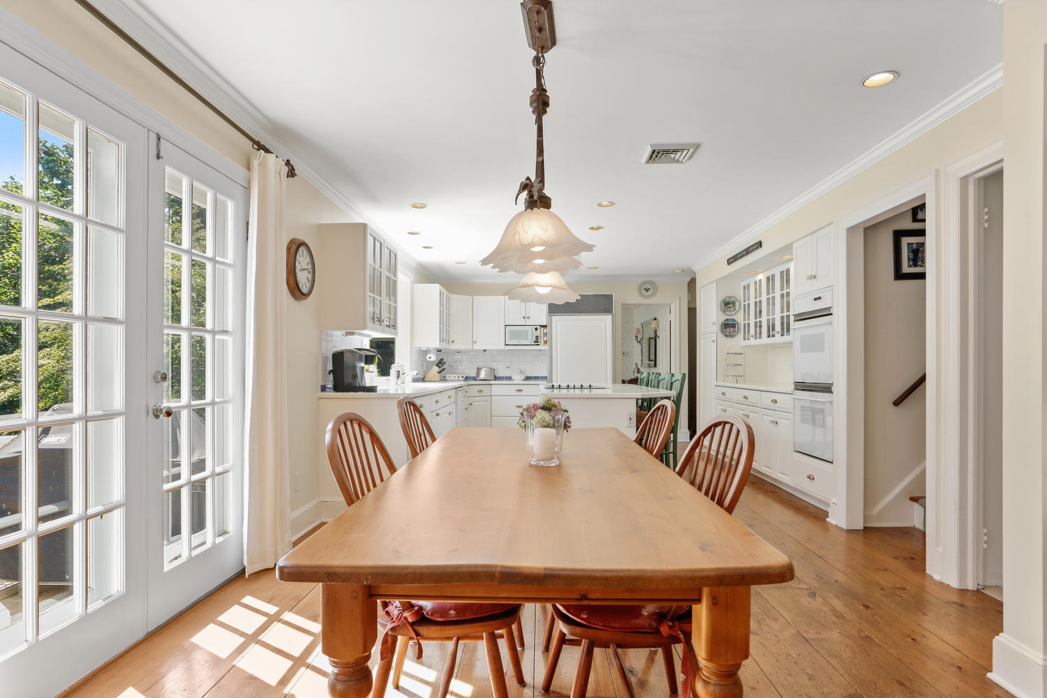 116 Marshall Ridge Road New Canaan, CT 06840 - Photo 29 of 50 a view of a a dining room with furniture window and wooden floor