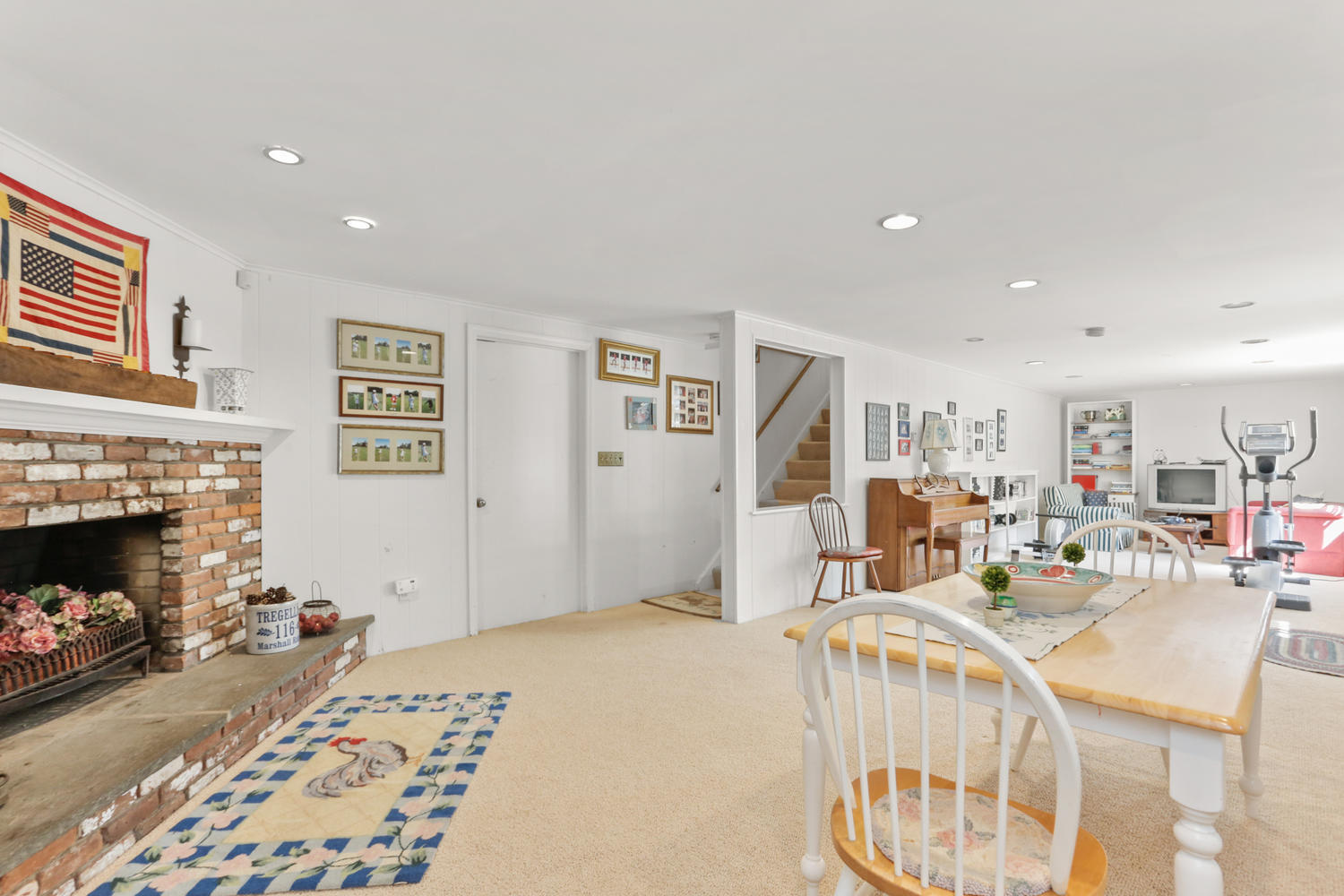 116 Marshall Ridge Road New Canaan, CT 06840 - Photo 33 of 50 a living room with furniture and a fireplace