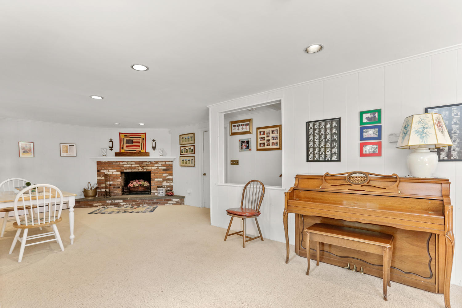 116 Marshall Ridge Road New Canaan, CT 06840 - Photo 34 of 50 a living room with furniture a fireplace and a flat screen tv