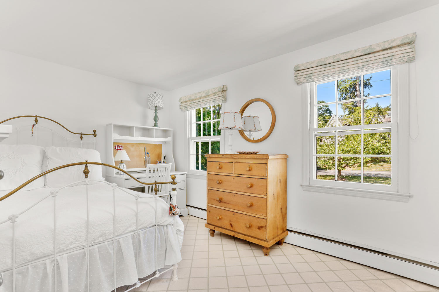116 Marshall Ridge Road New Canaan, CT 06840 - Photo 40 of 50 a white bed sitting in a room next to a window