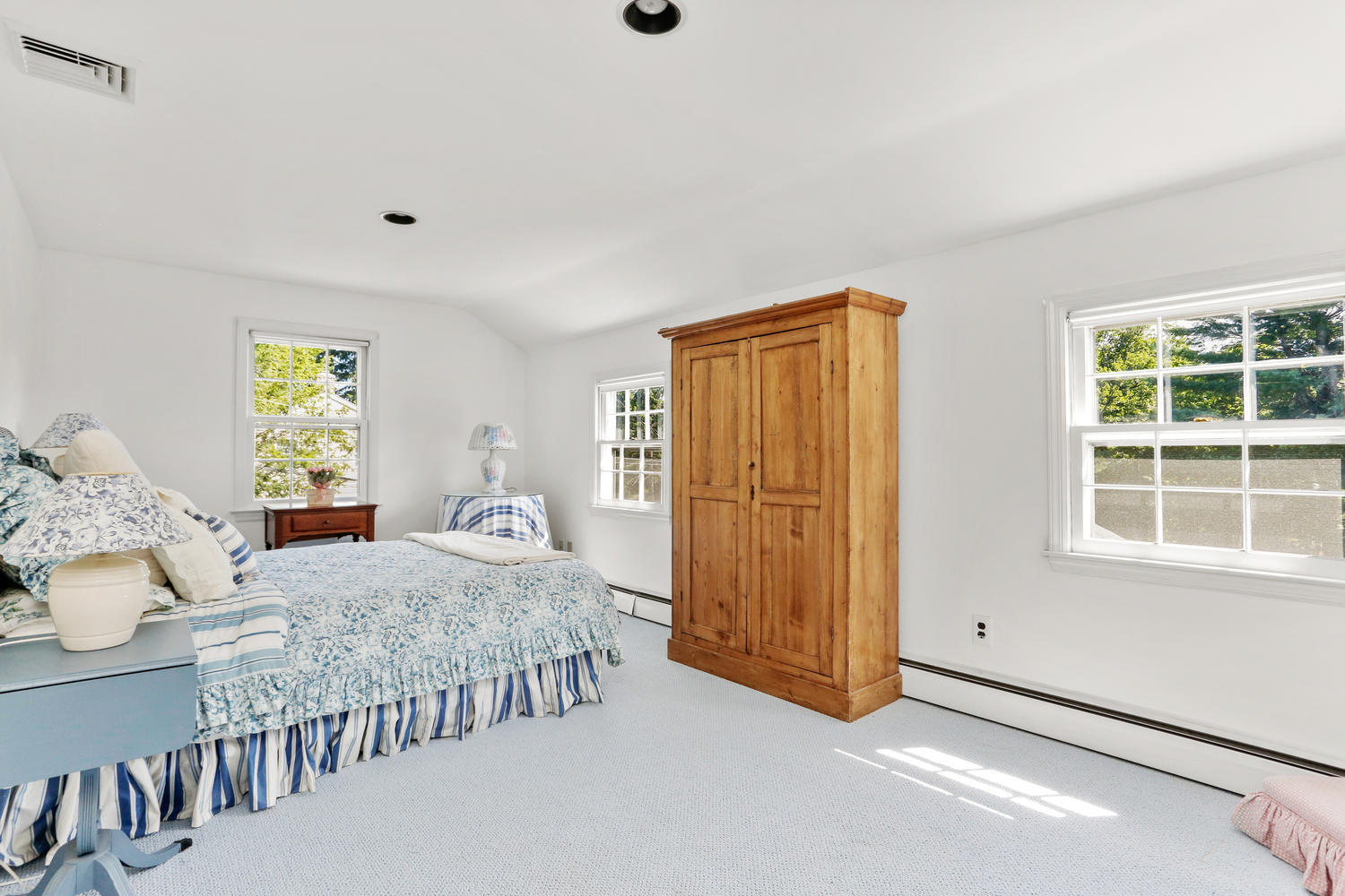 116 Marshall Ridge Road New Canaan, CT 06840 - Photo 43 of 50 a spacious bedroom with a bed and a window