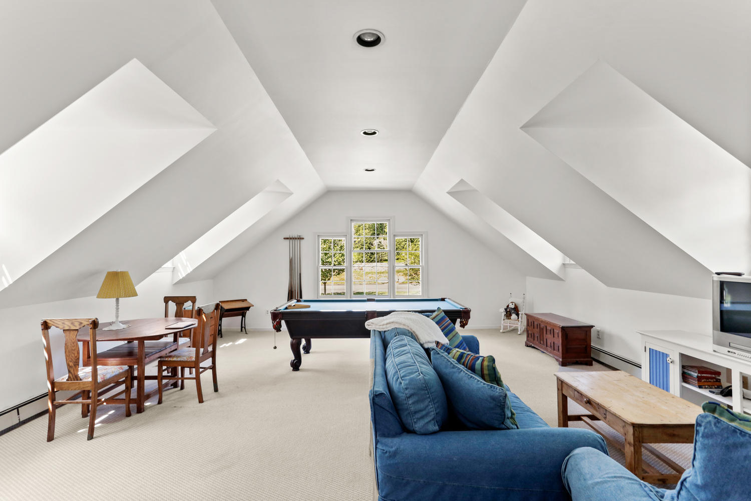 116 Marshall Ridge Road New Canaan, CT 06840 - Photo 45 of 50 a living room with furniture and a large window