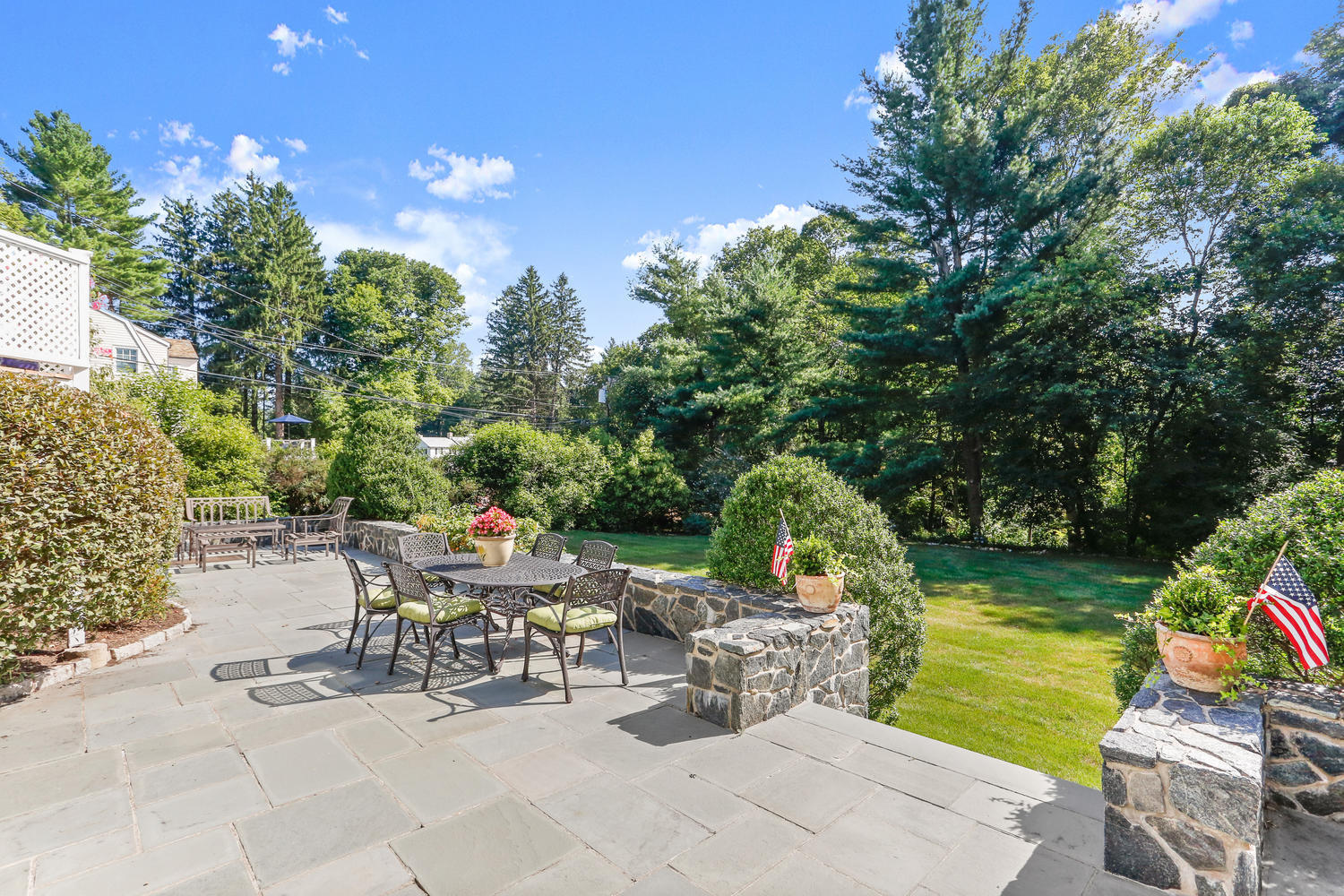 116 Marshall Ridge Road New Canaan, CT 06840 - Photo 6 of 50 a view of a lake with a patio