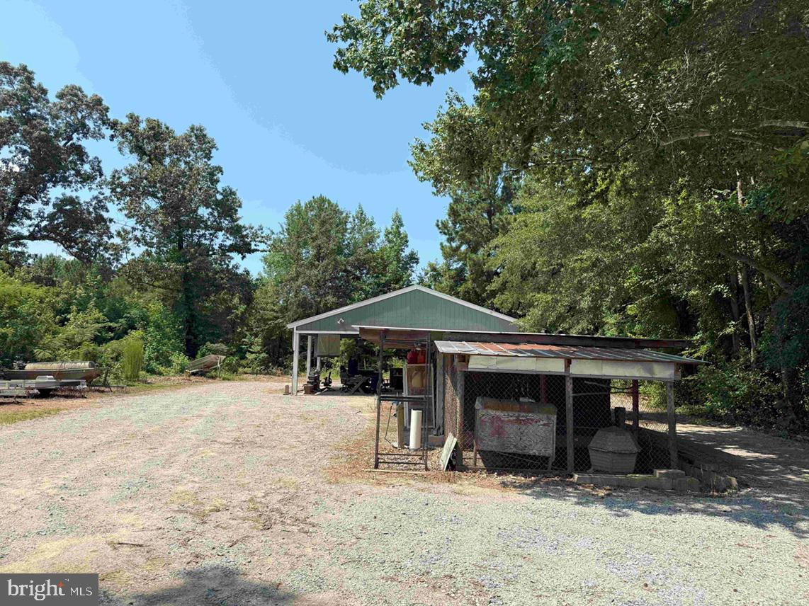 Tick Bite Road Grifton, NC 28530 - Photo 29 of 57 a view of a house with a yard and sitting area