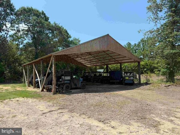 a bed room with a bed and a chandelier