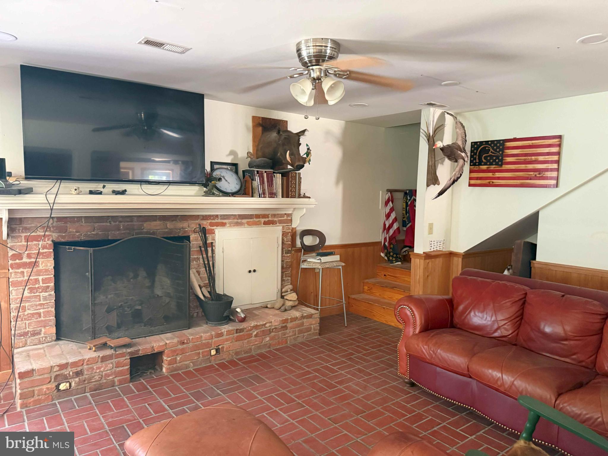 Tick Bite Road Grifton, NC 28530 - Photo 36 of 57 a living room with furniture and a fireplace