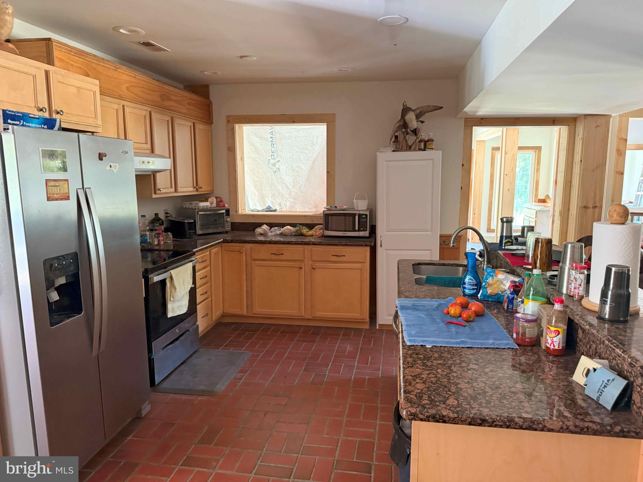 Tick Bite Road Grifton, NC 28530 - Photo 37 of 57 a kitchen with stainless steel appliances granite countertop a sink stove and refrigerator