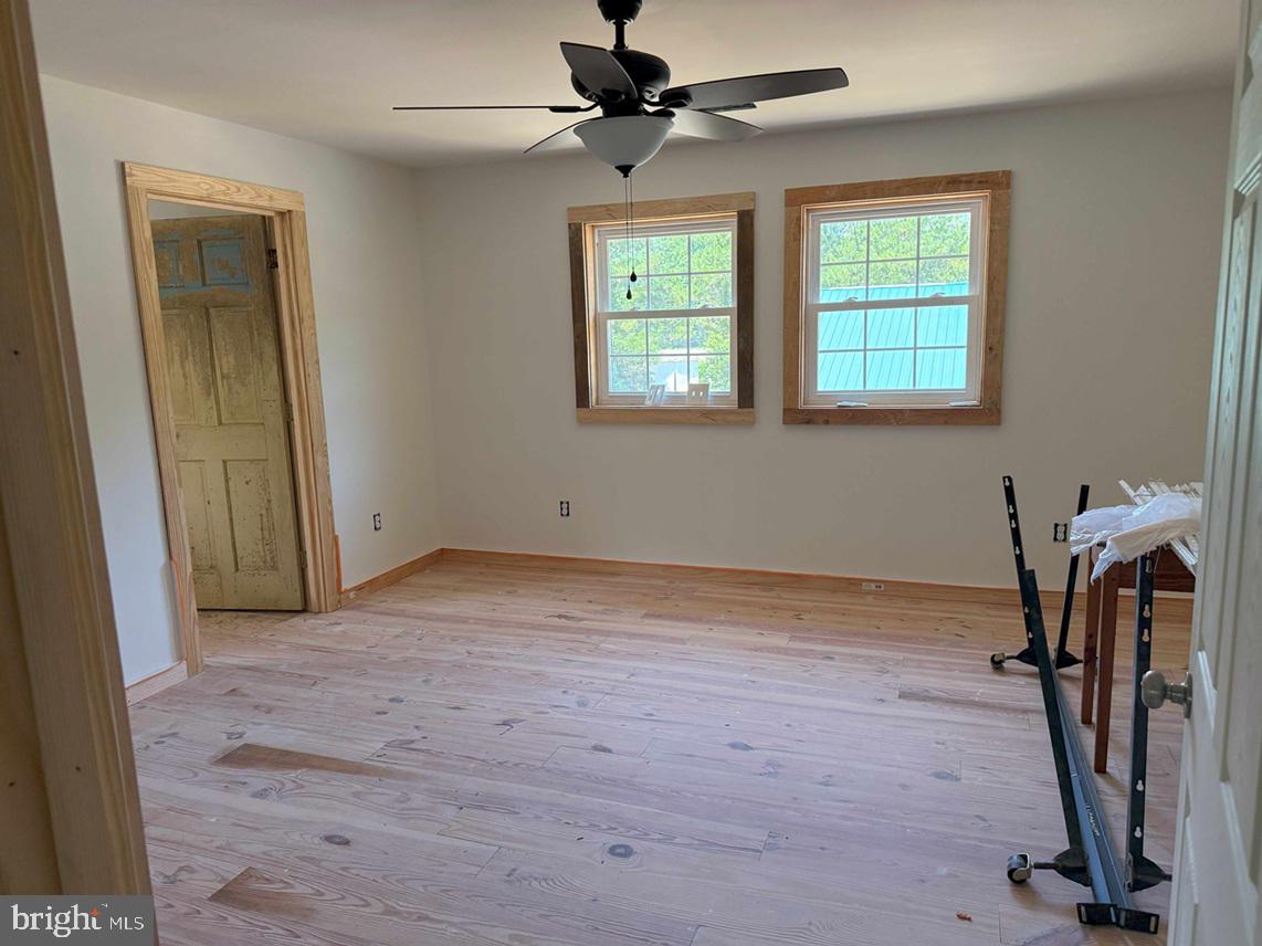 Tick Bite Road Grifton, NC 28530 - Photo 40 of 57 wooden floor in an empty room with a window