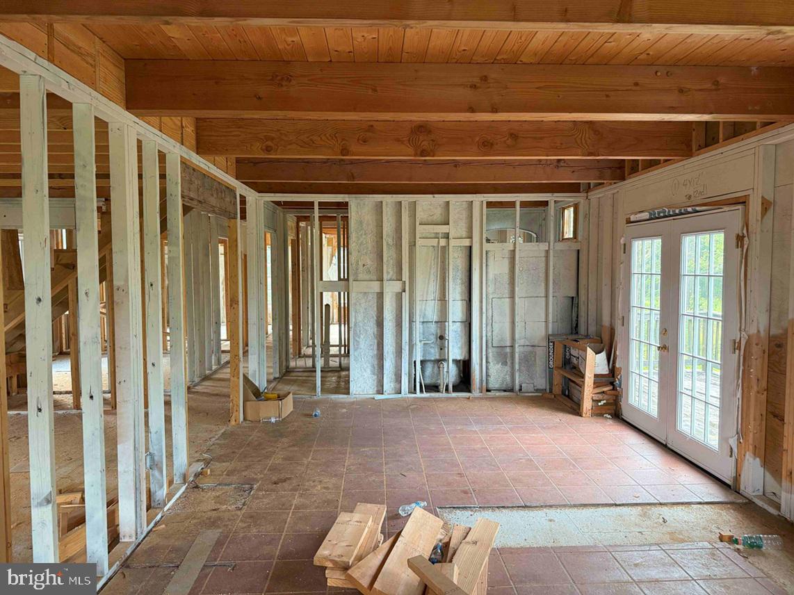 Tick Bite Road Grifton, NC 28530 - Photo 48 of 57 a view of room with stairs and a rug