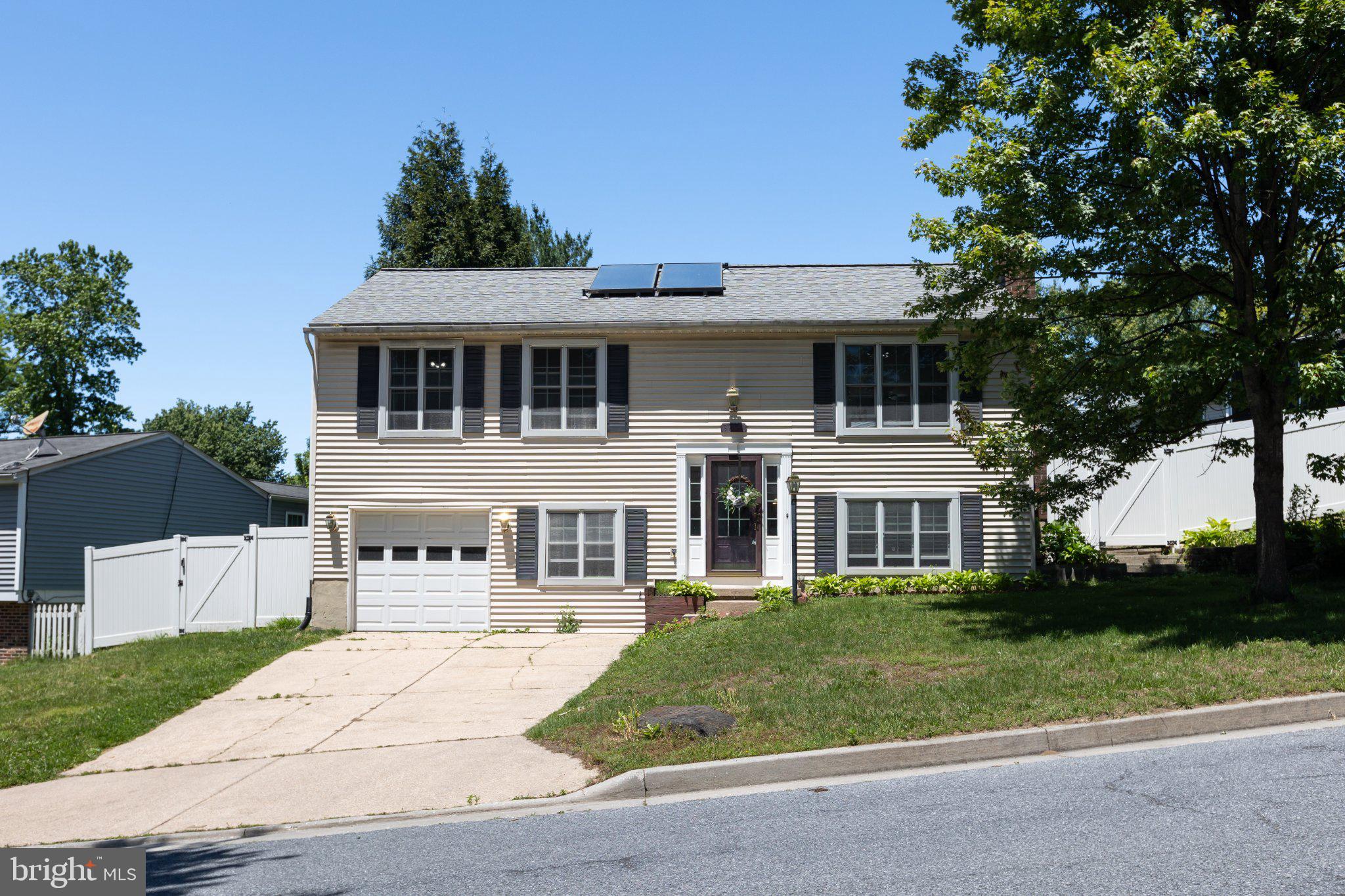 3613 Rusty Rim Ellicott City, MD 21043 - Photo 1 of 39 Charming split-level home with solar panels.