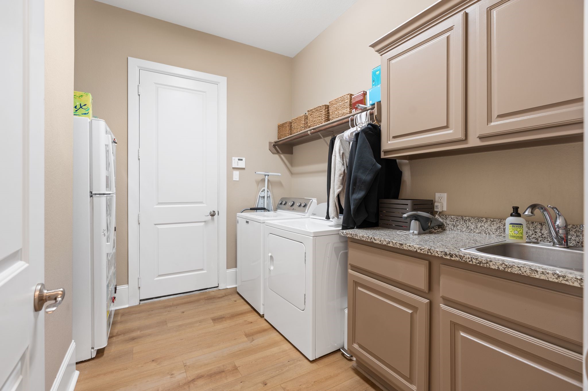 2914 Rutherford Pl Court Katy, TX 77494 - Photo 31 of 50 a kitchen with white cabinets and sink